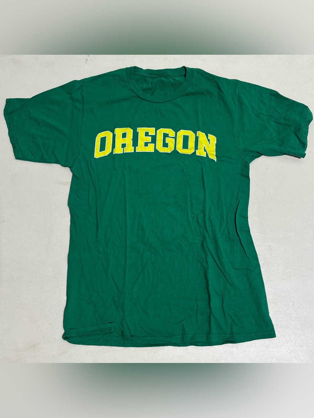 Green Oregon Graphic Tee with Yellow Lettering
